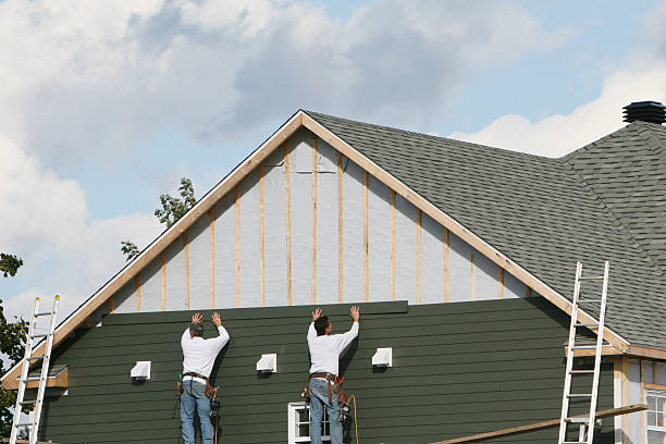 Professional Siding Contractor technician working in Windham, OH